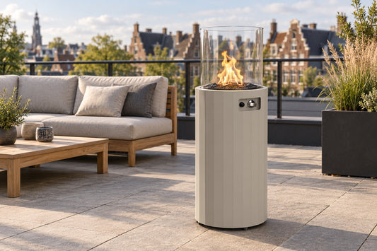 Planika Bino outdoor gas fireplace in Silk Gray on a city rooftop patio