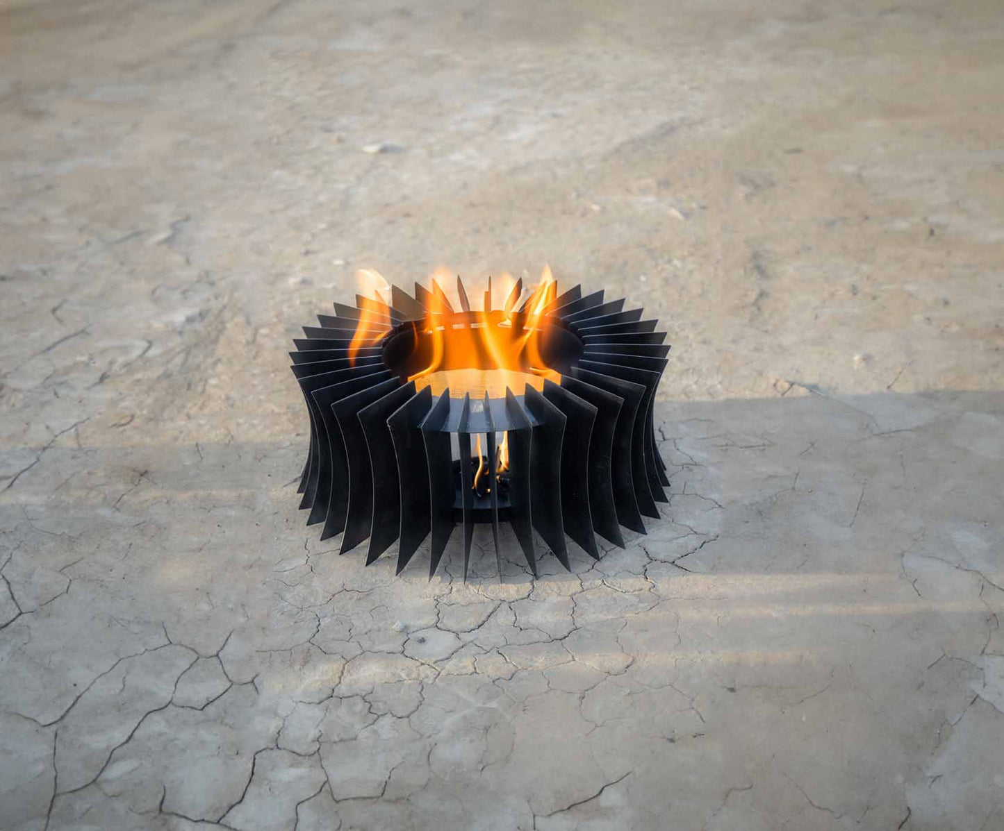 https://cdn.shopify.com/s/files/1/0759/2276/8110/files/Fire-Sculpture-15_Rosen.jpg?v=1765993008