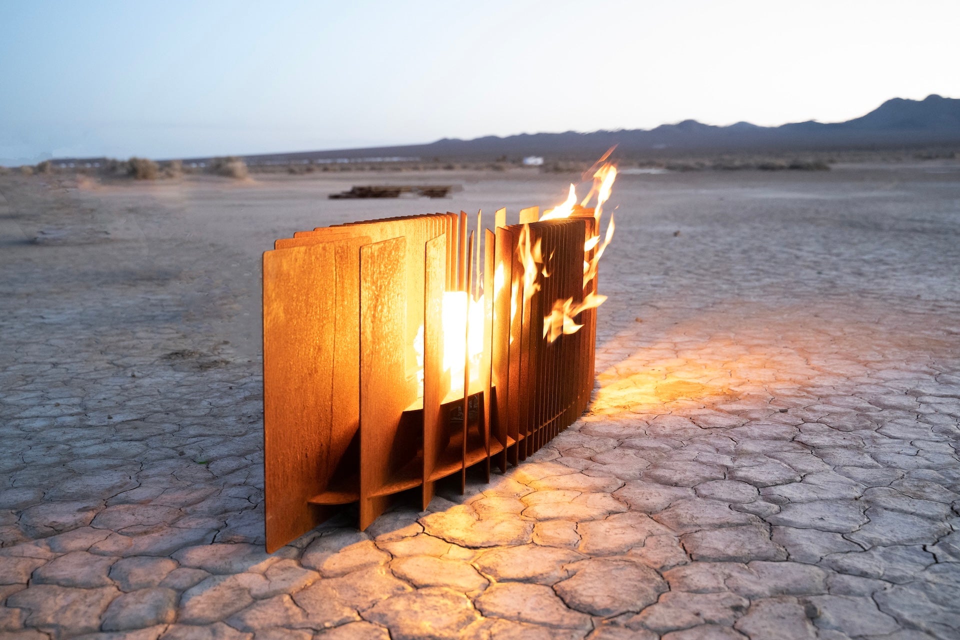 https://cdn.shopify.com/s/files/1/0759/2276/8110/files/Fire-Sculpture-The-Mobius-001.jpg?v=1765996307