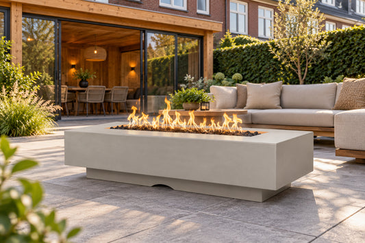 Del Mar Fire Pit GFRC Concrete by The Outdoor Plus in a garden setting