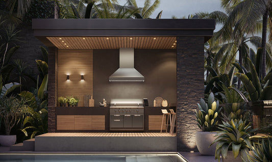 Falmec Pyramid Outdoor range hood above a grill in a covered outdoor pavilion kitchen