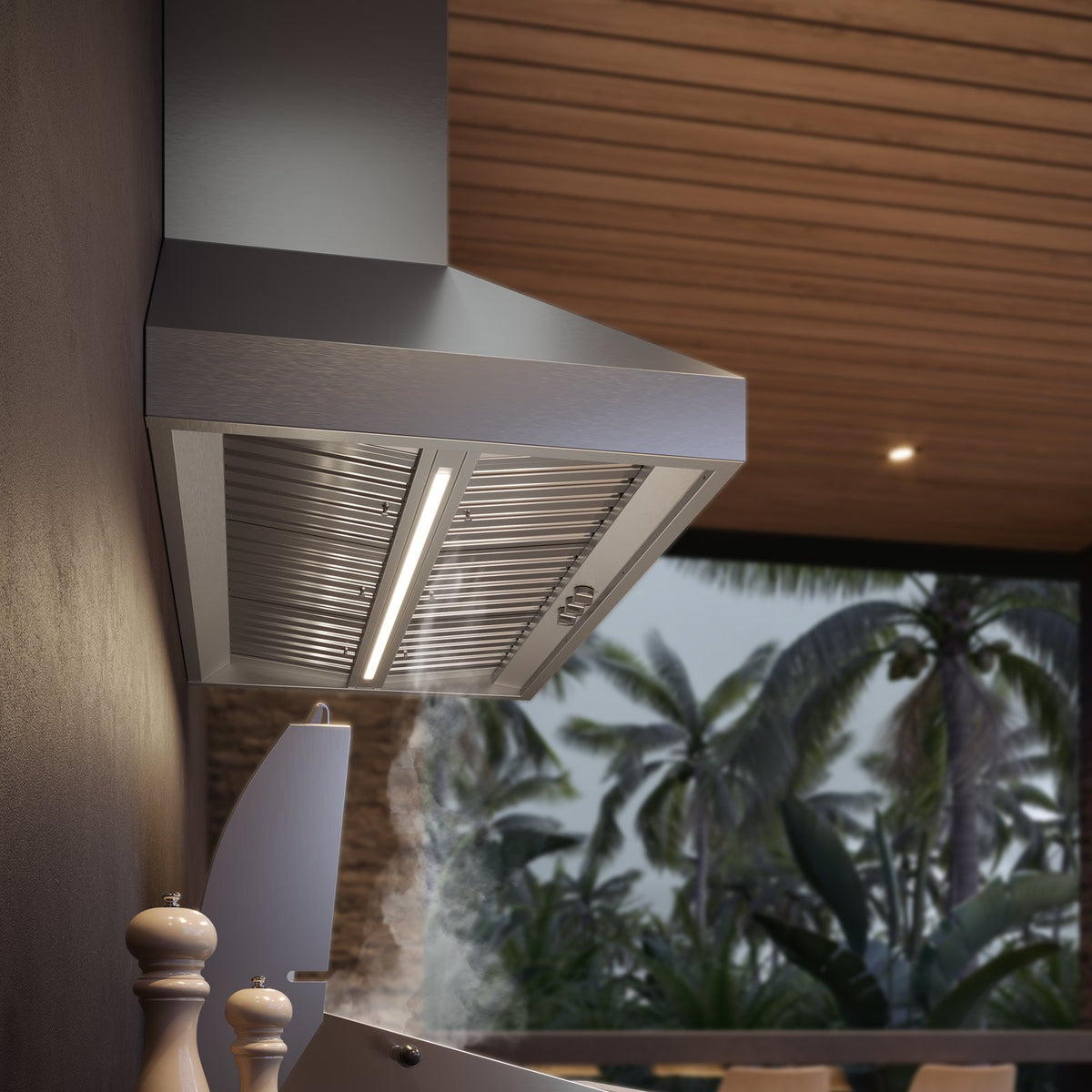 Underside of Falmec Pyramid Outdoor hood showing stainless baffle filters and 3000K LED strip