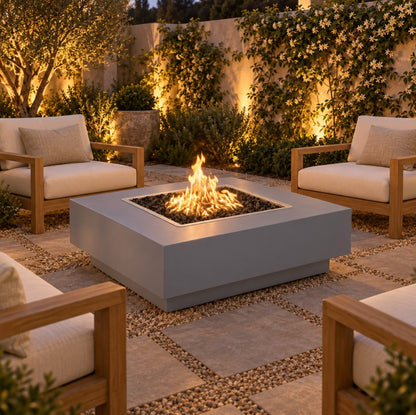 Cabo Square powder coat gas fire pit in a garden courtyard at dusk – lifestyle digital rendering, The Outdoor Plus