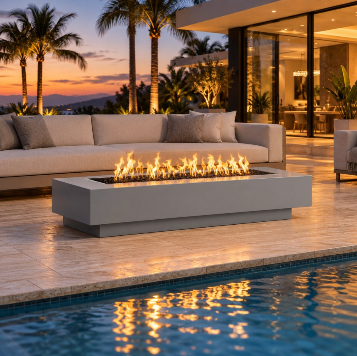 Coronado powder coat gas fire pit beside a pool at dusk – lifestyle digital rendering, The Outdoor Plus