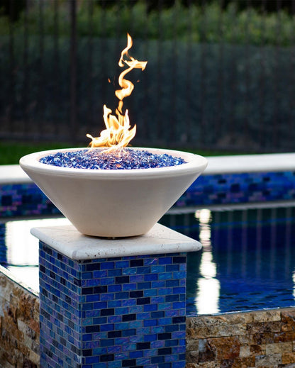 Cazo fire bowl glowing poolside at dusk