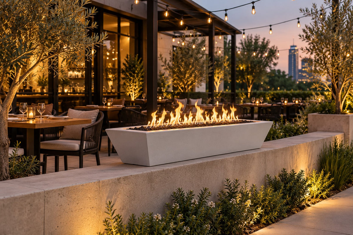 60" x 20" Linear Maya Fire Bowl - GFRC by The Outdoor Plus, on a restaurant patio wall