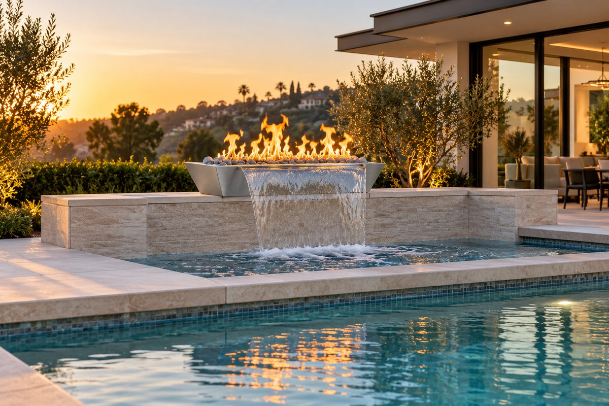 60" x 20" Linear Maya Fire & Water Bowl - Stainless Steel by The Outdoor Plus, installed on a raised spa wall