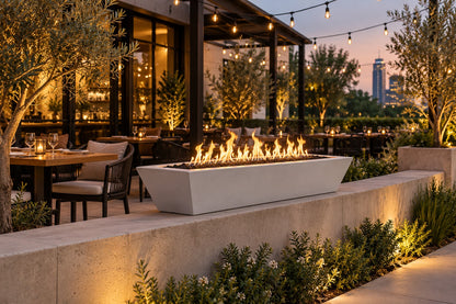 72" x 20" Linear Maya Fire Bowl - GFRC by The Outdoor Plus, on a restaurant patio wall