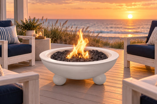 48" diameter Sedona Fire Bowl with Rounded Legs - Powder Coat by The Outdoor Plus, white finish in a luxury deck setting