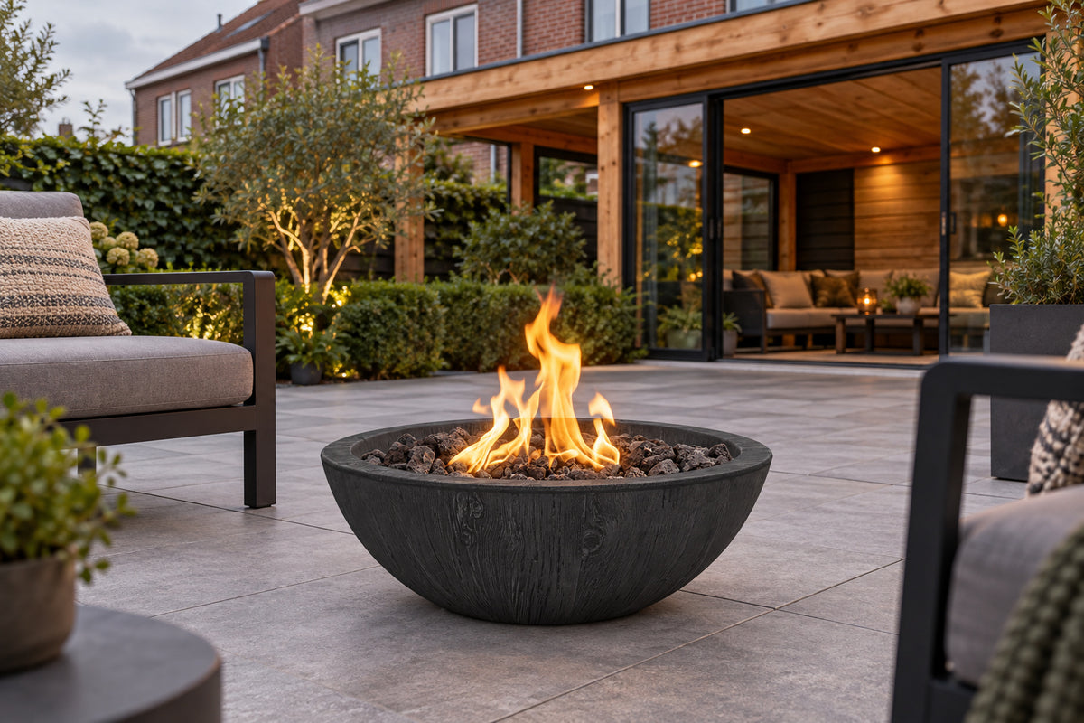 Sedona Fire Bowl GFRC Wood Grain by The Outdoor Plus in a garden setting