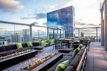 Del Mar GFRC concrete fire pit on a rooftop lounge