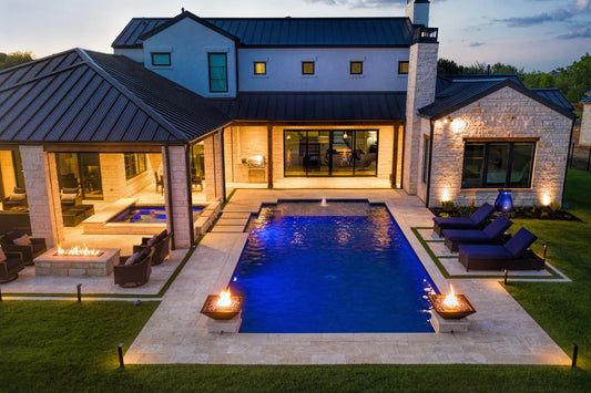 Maya fire bowl glowing on a luxury patio at dusk