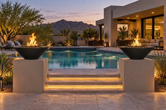 31" Cazo Fire Bowl - GFRC Concrete by The Outdoor Plus, a pair on pedestals flanking pool steps